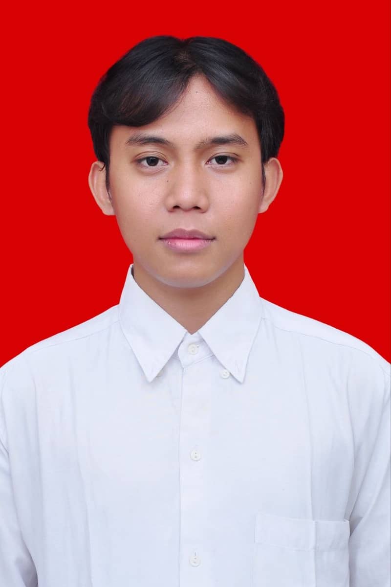 Formal portrait of Alfian Nur Usyaid in a white shirt against a red background